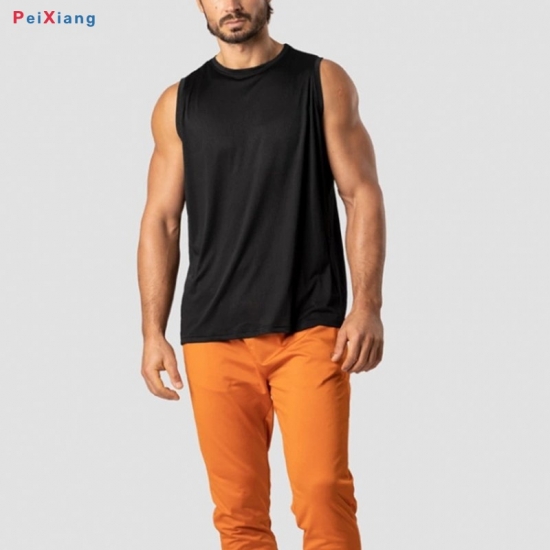 Man in black quick dry training vest front pose