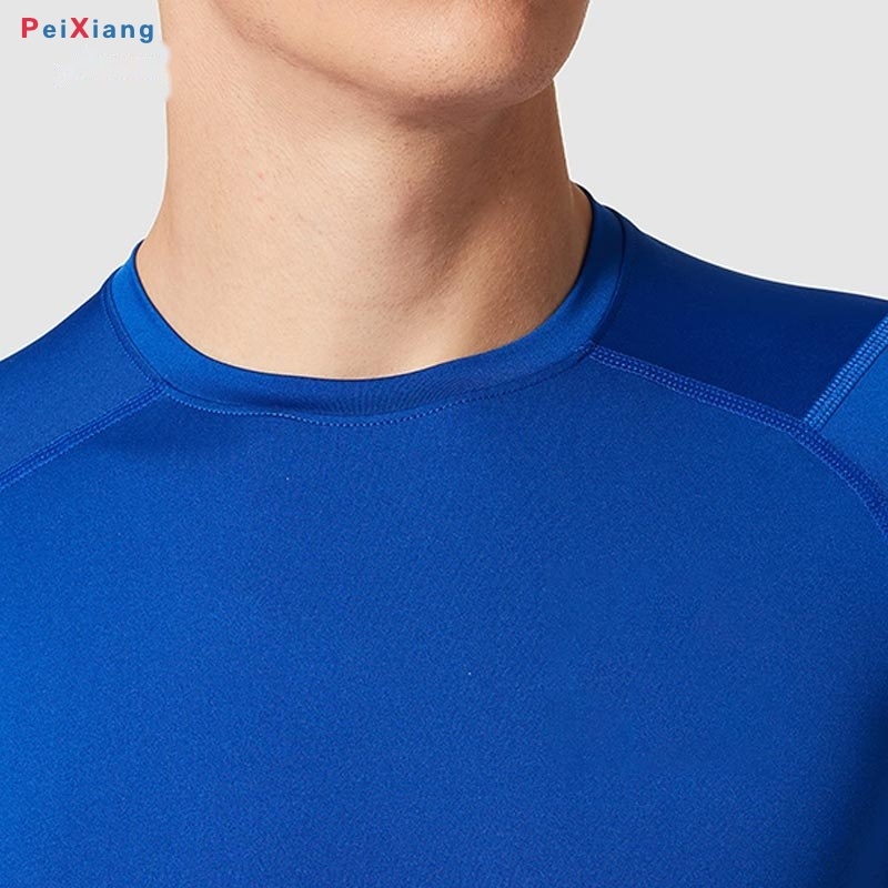 Men's blue compression tee collar detail