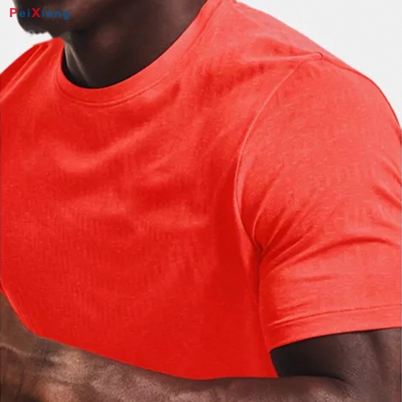 Men's orange-red slim fit gym tee fabric detail
