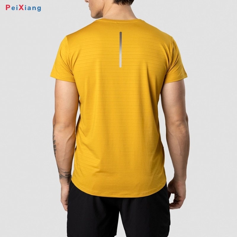 Men's mustard yellow cropped training tee back with reflective detail
