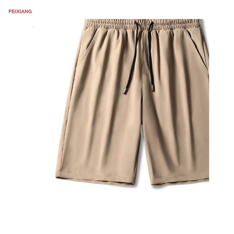 Men's grey sport shorts waistband and drawcord detail