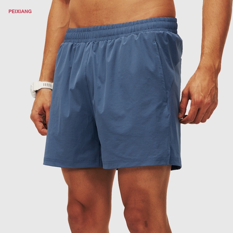 Men's lime yellow running shorts drawcord waist detail