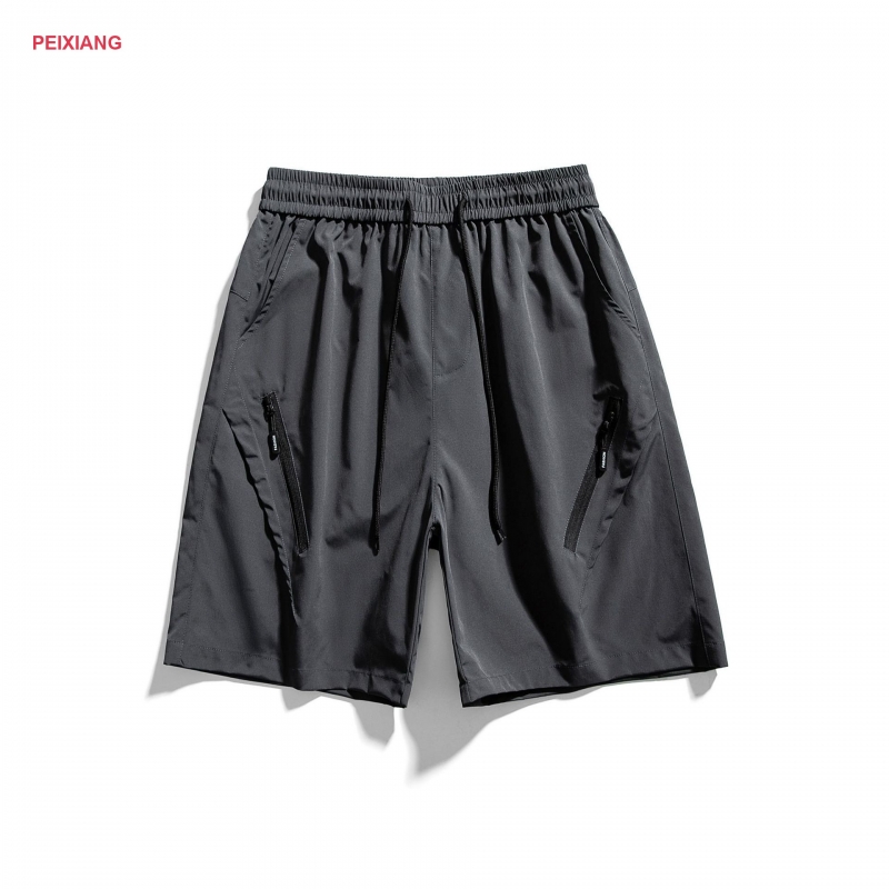 Deep teal training shorts side zip pocket with reflective detail